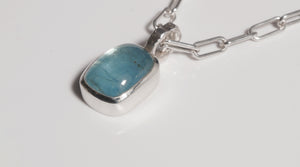 Aquamarine pendant on heavy silver chain