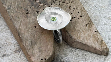 Silver double flower ring with small bezel set stone