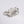 sterling silver abstract flower ring with three diamonds, one set in gold