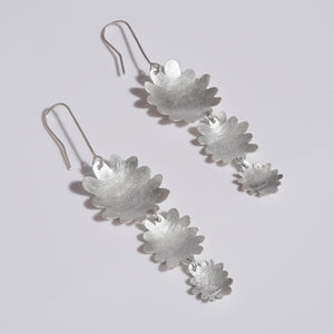 sterling silver abstract flower earrings with three dangles in decreasing sizes