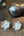 Textured silver flower earrings with a silver circle centre