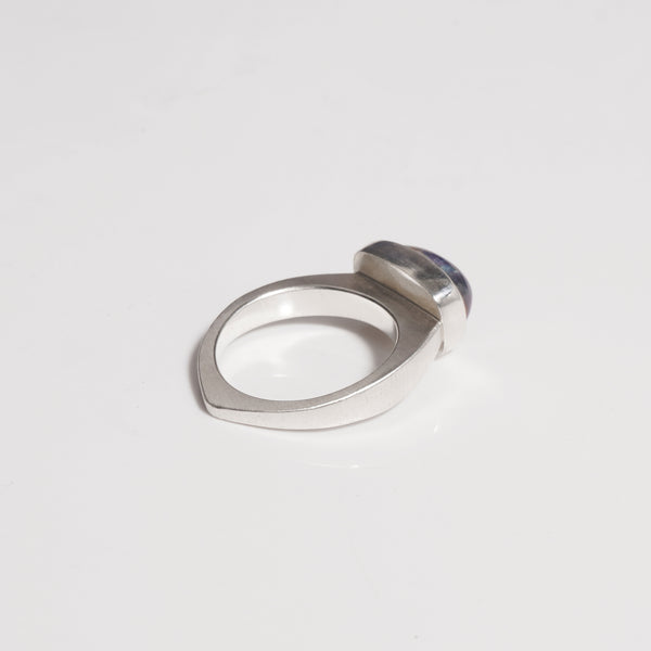 sterling silver sand cast ring with deep tanzanite stone, showing the reverse